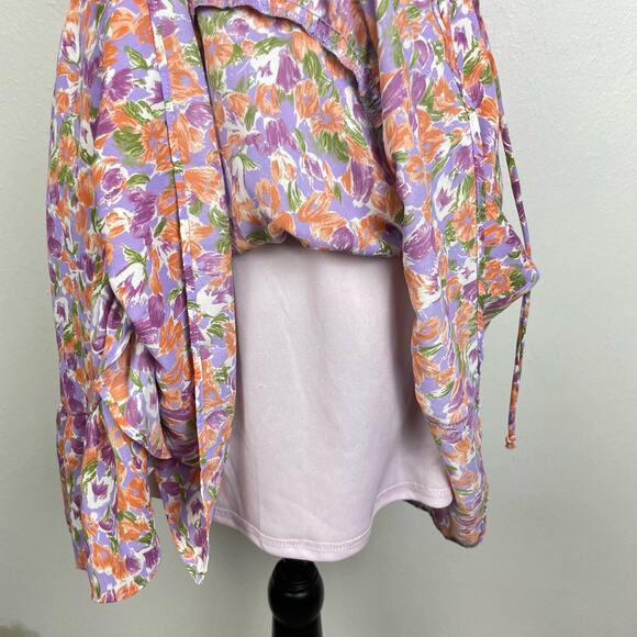 All in Favor | Colorful Floral Flutter Sleeve Faux Wrap Blouson Mini Dress - Picture 8 of 11